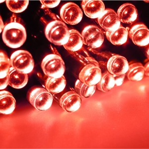 Photo of small red solar lights on a red background